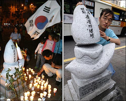 11일 오전 여중생을 추모하는 촛불시위가 열리고 있는 세종로 교보빌딩앞에 세워진 '자주평화 촛불기념비'가 누군가에 의해 파손된 채 발견됐다.(오른쪽 사진) 6월 13일 여중생 사망 1주기 추모행사때 사용한 촛불을 아이들과 함께 '촛불기념비'앞에 내려 놓고 있는 시민의 모습.(왼쪽사진) 